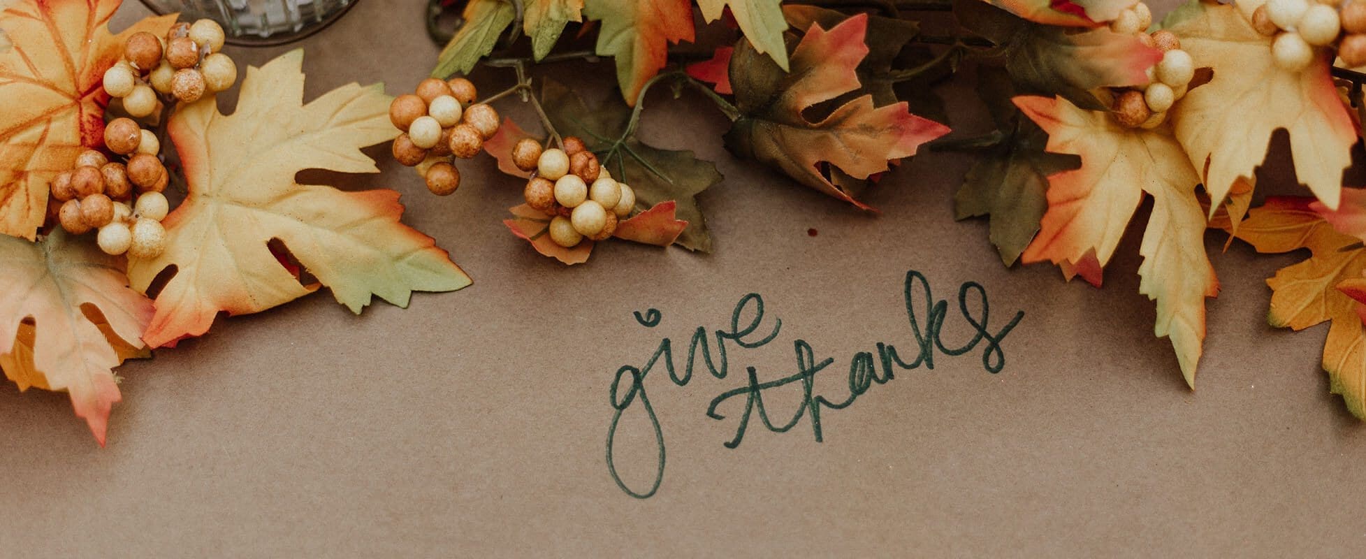 fall foilage on kraft paper with hand written note