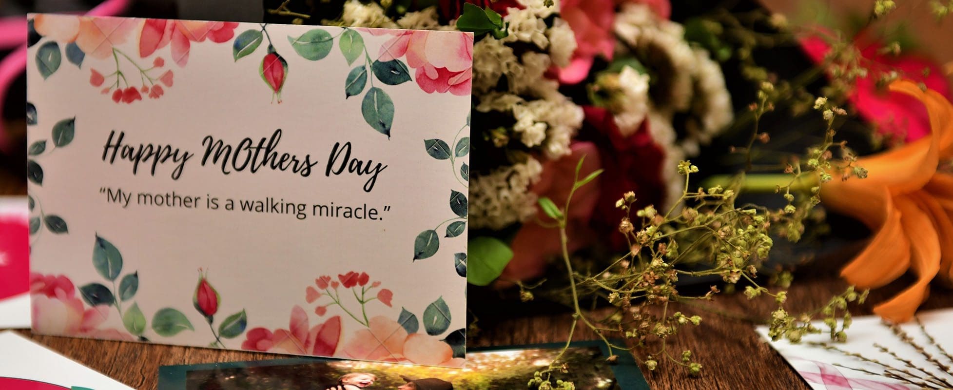 mothers day card wth gifts and flowers
